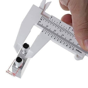 Aluminium Water Cooling Block 40mm x 200mm For Liquid Water Cooler Heat Sink System - shown being measured with a white plastic vernier caliper to indicate a 9mm width dimension.