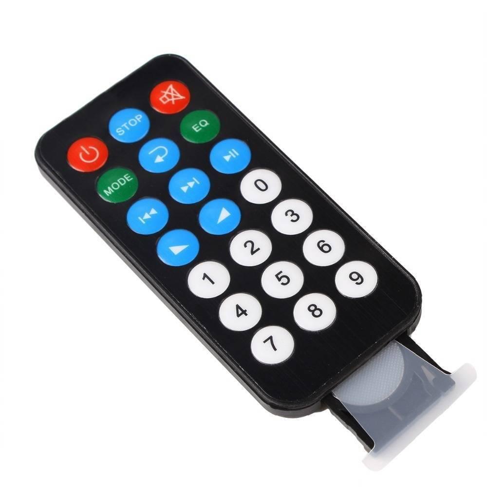 Arduino Infrared Remote - a black rectangular remote control with a numeric keypad, function buttons, and a plastic battery tab extending from the bottom.