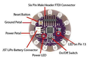 Arduino Lilypad Arduino 328 Main Board ATMEGA328P ATMEGA328 16M - a circular purple PCB with a JST connector, reset button, on/off switch, LEDs, and a six-pin FTDI header.