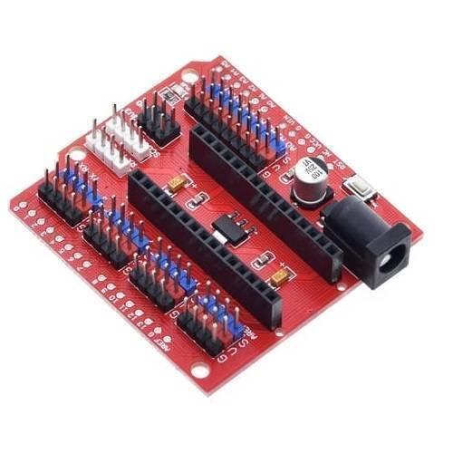 Arduino Nano Sensor Shield Nano I/o Expansion Board Prototype Shield - a red circuit board with multiple pin headers, a power jack, and a capacitor.