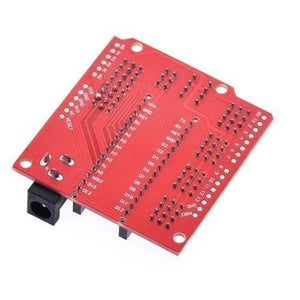 Arduino Nano Sensor Shield Nano I/o Expansion Board Prototype Shield - a red rectangular circuit board with multiple pin headers and a black barrel power connector.