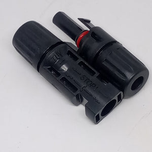 Big Size 50MMX17MM 30A 1500V Male Female MC4 Connector For Solar Panel DC Wire Cable - a pair of black male and female plastic electrical connectors with TUV and STOP markings on the housing.