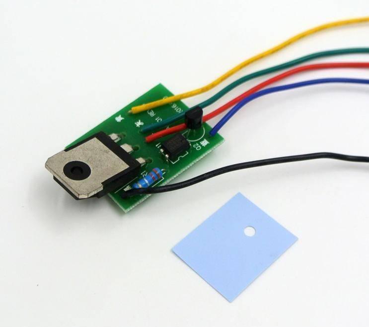 Ca 901 Switching Power Supply Repairing Module SSH7N90 - shown as a green circuit board with a large transistor, wires, and a blue thermal pad accessory.