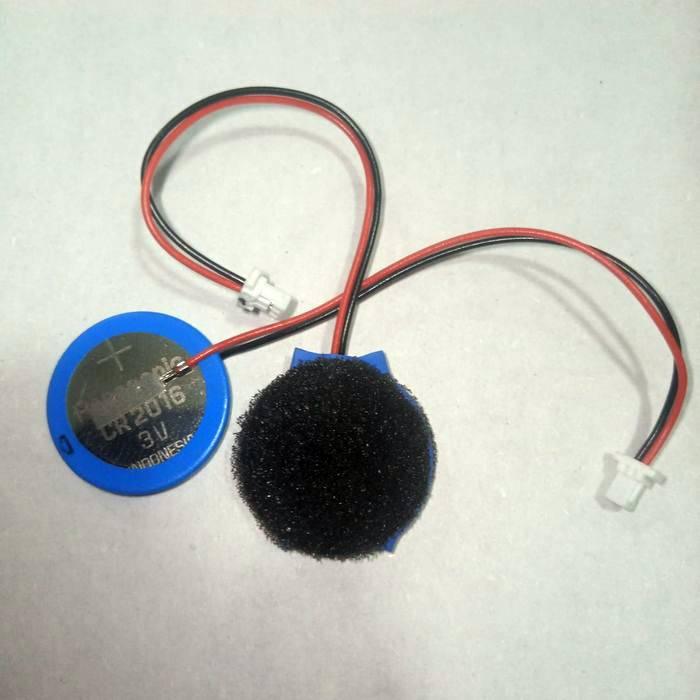 CR2016 Coin Cell With Wire And Jack For Laptop And General - a blue CR2016 3V battery connected to two wires with small white connectors.