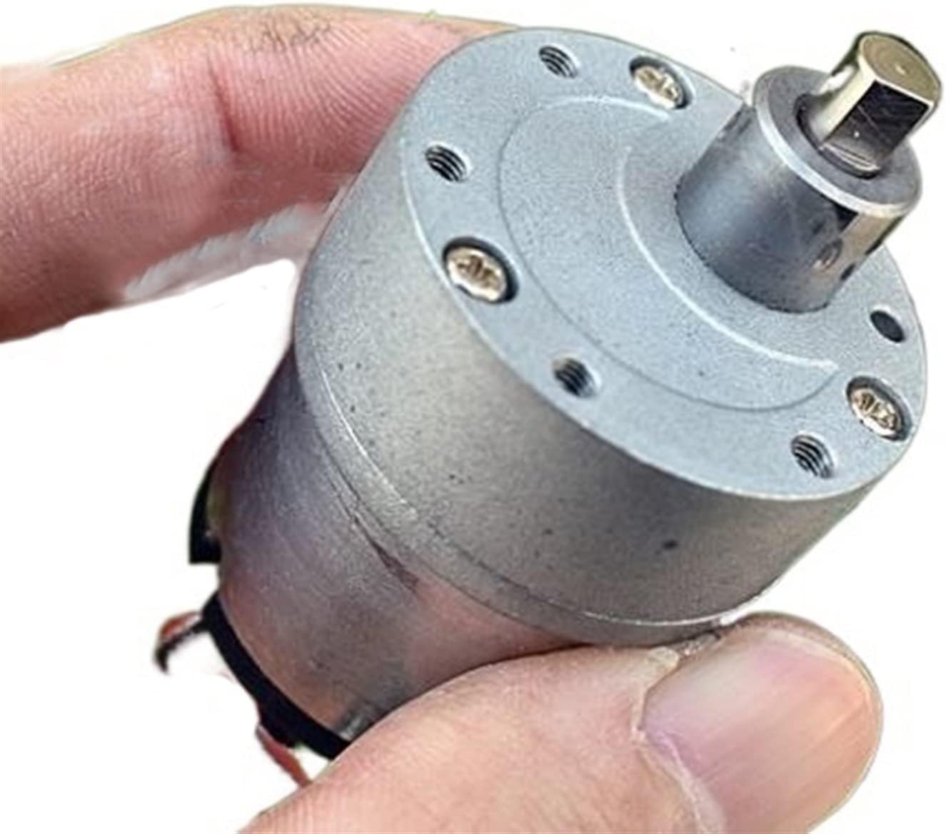 DC 12V 420 RPM With Metal Gears Small Motor - shown in a close-up view held by a hand, featuring a cylindrical silver body and a flat-sided metal shaft.
