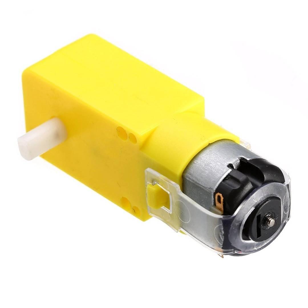 DC 3V 6V DC Gear Motors - a yellow plastic gearbox with a white output shaft attached to a silver metal motor with two electrical contact terminals.