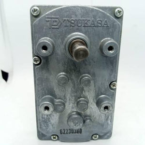 DC Worm Gear Motor AXO40231 - the grey metal casing with a central output shaft, mounting holes, and the Tsukasa brand name embossed on top.