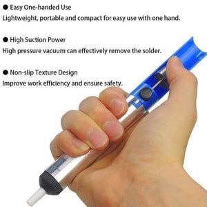 Desoldering Pump Solder Sucker - held in a hand, featuring a silver metal body, a blue plastic top with a black release button, and a white nozzle.