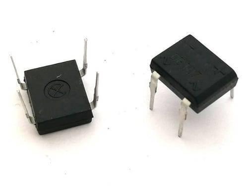 DF06M 600V 1A Bridge Rectifier Diode IC - two black, square-shaped electronic components with four metal pins each, viewed from different angles.