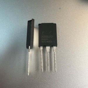 DG50Q12T2 50amp 1200V Dosemi | High-power IGBT Module | Digilog.pk - two black, three-pin electronic components on a silver surface, one viewed from the front and one from the side.