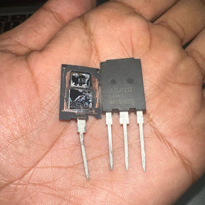 DG75X12T2 75amp 1200volt Dosemi | High-power IGBT Module | Digilog.pk - one intact black three-pin component next to a damaged one with exposed internal silicon chips held in a hand.