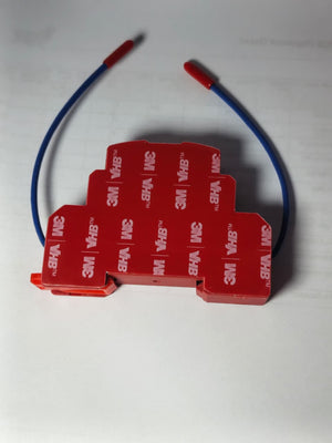 DIGILOG QRR0.01G Heat Aerosol Fire Extinguishing Device - a red, stepped-shape module with 3M VHB adhesive backing and two blue wires with red tips.
