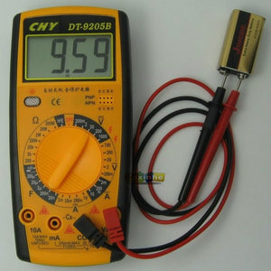 Digital Multimeter - DT-9205B - a yellow and black handheld device with a screen showing 9.59, a central rotary knob, and probes connected to a 9V battery.