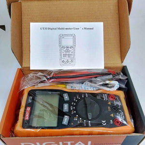 Digital Multimeter Uat-d Ut 32 - in its open cardboard box, featuring an orange handheld unit with a rotary dial, display, and included manual and leads.