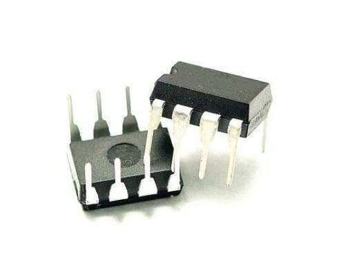 DIP-8 Gate Drivers IC Chip IR2104 - two black, 8-pin dual in-line package (DIP-8) integrated circuit chips sitting on a white surface.