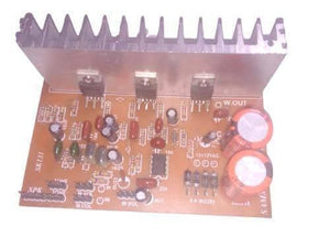 Discontinued Audio Amplifier Board - a brown circuit board featuring a large metal heat sink, three transistors, two large capacitors, and pin headers.