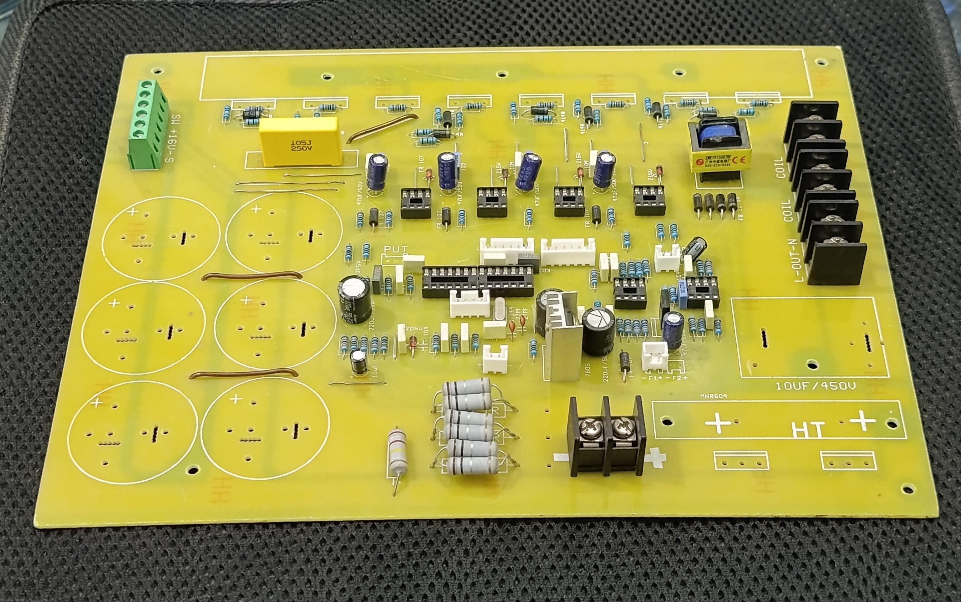 Discontinued Local 8 IGBT 7kVA Solar Inverter PCB with Pre-Assembled Components - a yellow circuit board populated with capacitors, resistors, IC sockets, and terminal blocks.