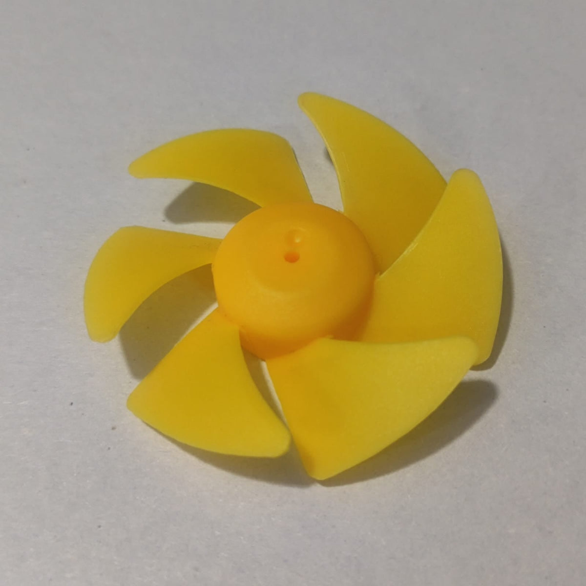 DIY Boat Model 6-blades Propeller 2mm Vortex Fan Paddle Toy Car Fan Spare Part 2*50mm - a bright yellow plastic six-blade propeller with a central mounting hole, shown from a top-down angle.