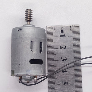 DIY DC Motor DC 3V To 25V Torque Mini Motor 17500RPM - shown as a silver cylindrical motor with a worm gear shaft, two wires, and a metal ruler for scale.