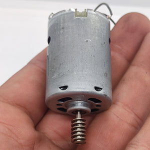 DIY DC Motor DC 3V To 25V Torque Mini Motor 17500RPM - shown as a silver cylindrical motor held in a hand with a metal worm gear attached to the shaft.