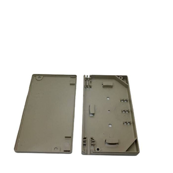 Durable 120x69x11mm ABS Plastic Enclosure Box - shown as two separate beige rectangular plastic housing pieces with internal mounting clips and screw holes.