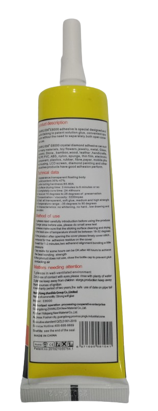 E8000 White Glue 50ML - shown as a yellow and white squeeze tube with detailed product description and technical specifications printed on the label.