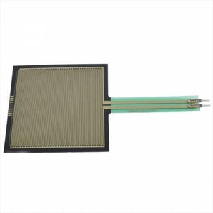 Force Sensitive Resistor Square Sensor Fsr 406 - a flat, square black sensor with a gold-colored grid pattern and a green tail with two metal pins.