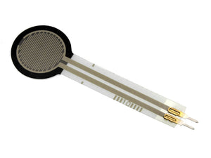 Fsr 0.6 Inch Force Sensitive Resistor - a circular black and white pressure sensor with a flat tail ending in two gold-colored metal connector pins.