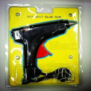 Glue Gun For 11mm Glue Sticks 80W 50/60Hz - shown in its original yellow and clear plastic blister packaging with a black body and red trigger.