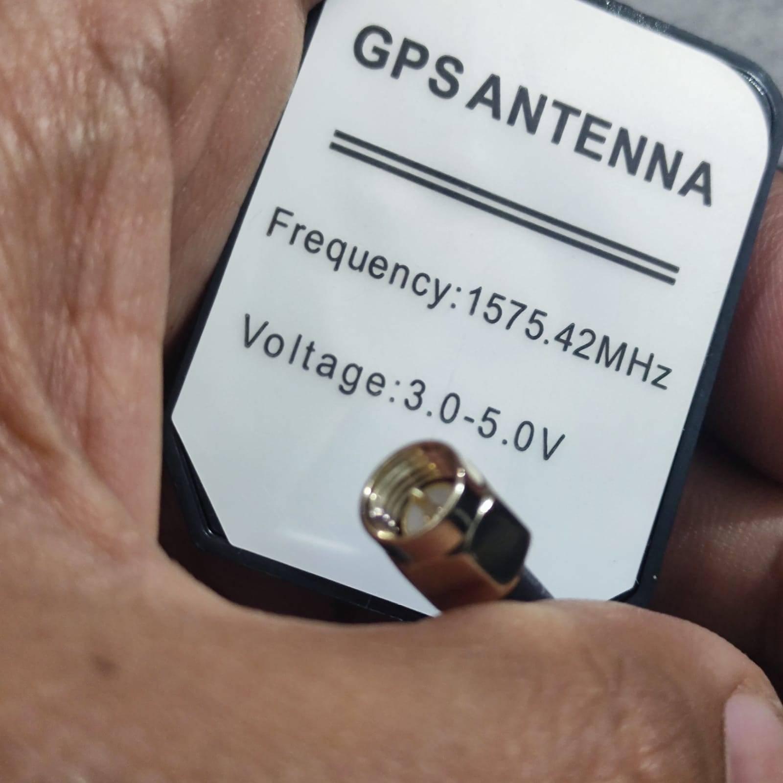 GPS Antenna External Active Antenna For GPS – 3-5V 28DB - a close-up showing the white label with frequency and voltage specifications and the attached gold-coloured connector.