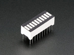 Green 10 Segment Light Bar Graph LED Display - a rectangular component with ten white rectangular light segments and twenty metal pins on the bottom.