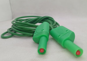 Green Banana Clip Wires 2 Meter | High-Quality Test Leads | Digilog.pk - two green test leads with red-tipped banana plugs connected by a coiled green wire on a white background.