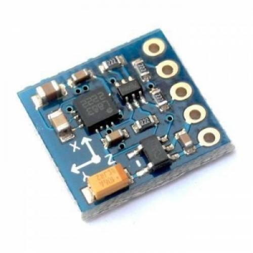 Gy 271 3-axis Magnetic Electronic Compass Module - a square blue circuit board with a central chip, surface-mounted components, and five gold pin holes.