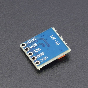 Gy 271 3-axis Magnetic Electronic Compass Module - a small square blue circuit board with five labeled pin holes: VCC, GND, SCL, SDA, and DRDY.