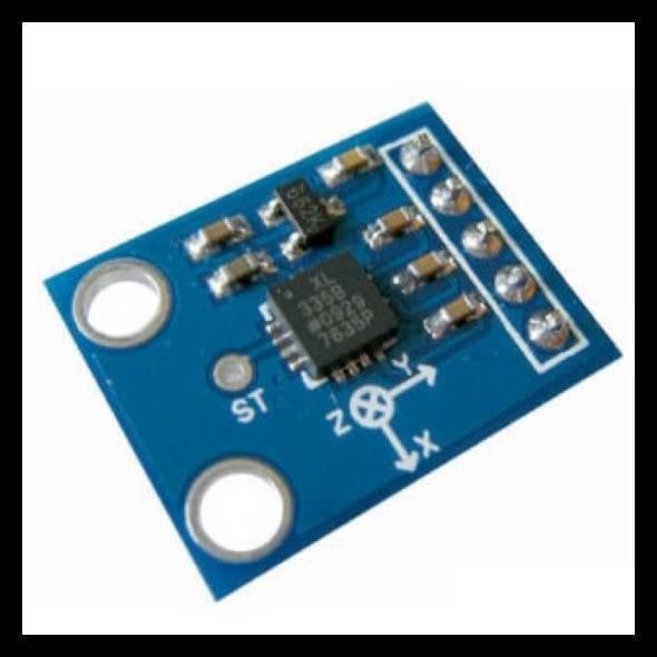 Gy-61 Triple Axis Accelerometer ADXL335 - a blue rectangular circuit board featuring a central chip, surface-mounted components, and a five-pin header.