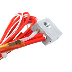 Heater Block 3d Printer Heat Block For 3d Printer - a silver metal block with a threaded hole, a small brass nozzle, and attached red wires.