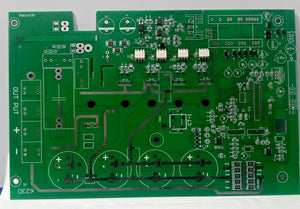 Imported 4 IGBT 5kVA Solar Inverter PCB With Pre Assembled SMD Components For Inverter Manufacturers Not Hobbyists - a green rectangular circuit board featuring pre-assembled SMD components, capacitor slots, and output terminals.