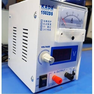 Kada 1502DS Adjustable Digital Power Supply 12V 2A DC Regulator Supply For Mobile Repairing - a white box with an analog ammeter, a digital voltage display, a voltage control knob, and red and black output terminals.