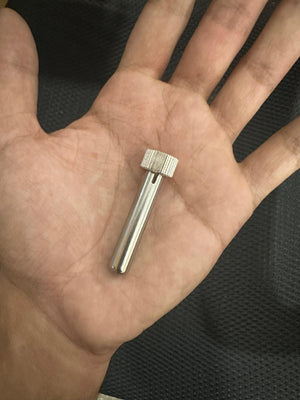Kada 903D Tip Enclosure - a silver-coloured metal cylindrical sleeve with a knurled top cap, held in a person's palm.