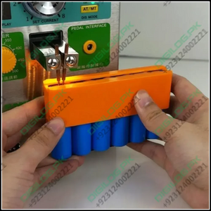Lithium Battery Fixture Single Row Double-sided 18650 Battery Spot Welding Fixer Battery Pack Fast Welding Fixed Bracket G8tb - shown holding a row of blue batteries under a spot welder's probes.