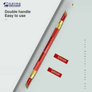 MECHANIC MULTIFUNCTIONAL REPAIR BLADE SET - long red and gold dual-ended handle with textured grips, featuring two angled blades labeled with the Mechanic logo, accompanied by two separate rectangular blades.