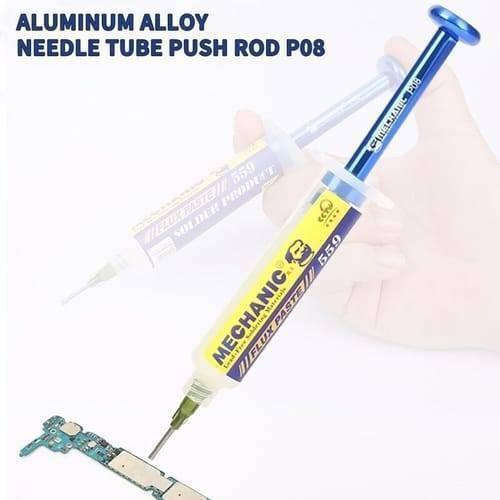Mechanic P08 Aluminum Alloy Needle Tube Piston Solder Paste Flux Welding Oil Booster Pusher - shown with a blue metal plunger and a syringe of Mechanic 559 flux paste above a circuit board.