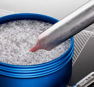 MECHANIC QR12 TIP REFRESHER - Soldering Accessory - a metal soldering iron tip with a reddish end submerged in a blue cylindrical tin filled with metallic cleaning shavings, with a second tip marked 900M-T-IS below.