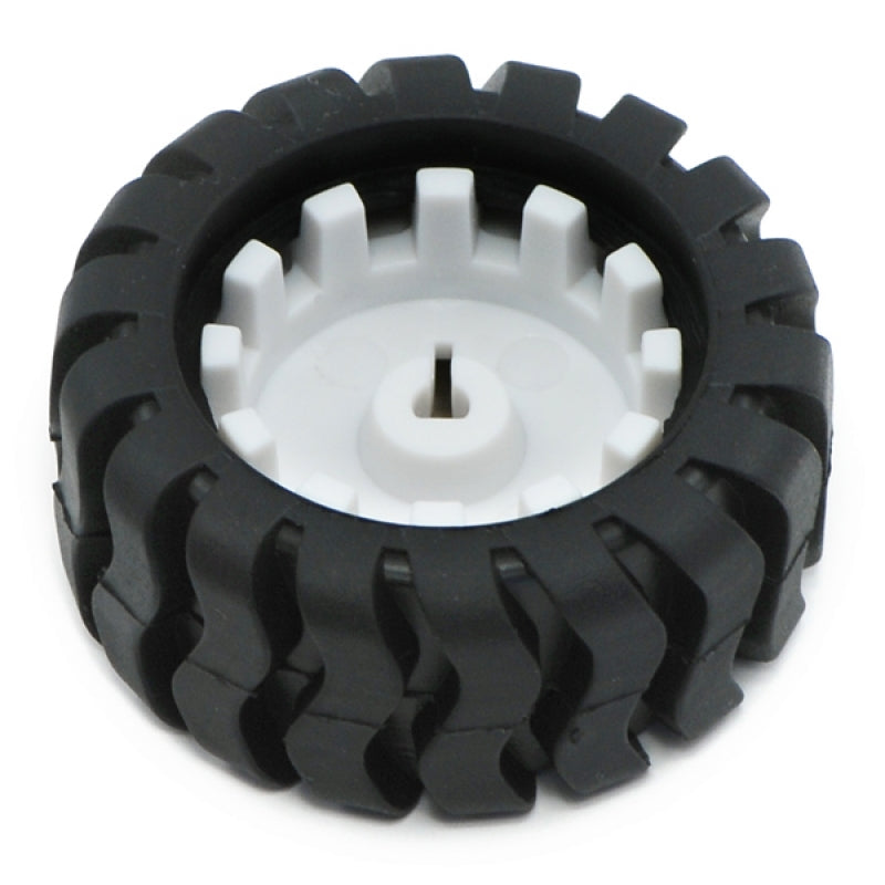 Mini Car Wheel Tyre 43mm For N20 DC Gear Motor | Best Arduino Product Store Digilog.pk - a close-up of a black rubber tire mounted on a white plastic wheel with a central D-shaped hole.