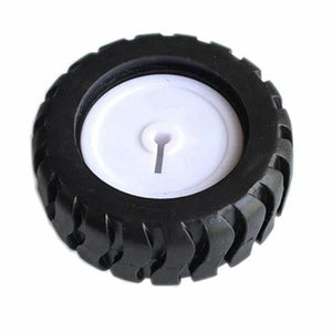 Mini Car Wheel Tyre 43mm For N20 DC Gear Motor | Best Arduino Product Store Digilog.pk - a black rubber tire with a tread pattern mounted on a white plastic wheel with a central keyhole.