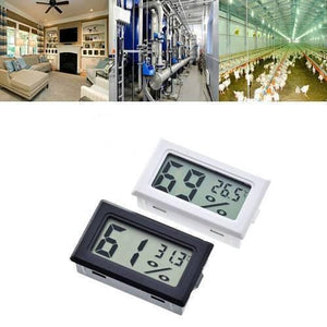 Mini Digital Thermometer Hygrometer Temperature Humidity Meter Fy-11 - one black and one white unit, each with a digital display showing humidity and temperature readings.