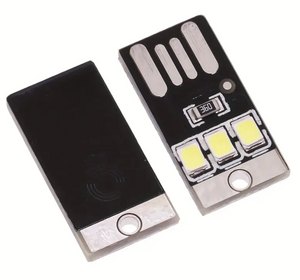 Mini LED Ultra Thin USB Powered LED Lamp Camping Night Light - two black rectangular circuit boards with three white LEDs, a resistor, and a USB connector.