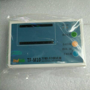 ML-258 TF-M10 LED Digital 7 Segment Tester. - a white rectangular device with a blue panel, pin sockets, and three buttons.