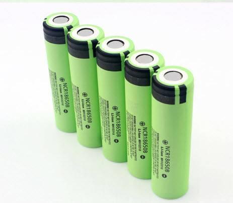 NCR18650B 3.7V to 4.2V 2000mAh Lithium battery 18650 Cell Battery - five green cylindrical 18650 batteries arranged in a row showing the positive terminal tops and printed labels.