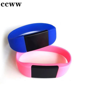 NFC IC 125kHz Bracelet RFID - one blue and one pink silicone wristband, each featuring a black rectangular central module.